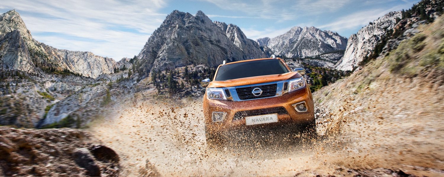 Nissan Navara front driving shot in the mud