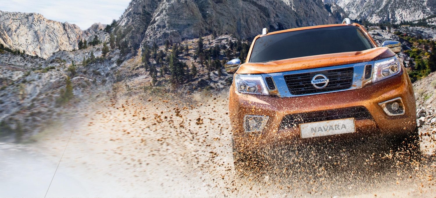 Nissan Navara front driving shot in the mud